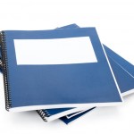 Blue school textbook, notebook or manual with white background